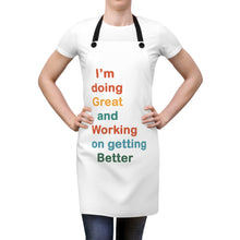 Load image into Gallery viewer, I’m Doing Great and Working on Getting Better” — Motivational Cooking Apron, Inspirational Gift for Chefs, Home Cooks, Fun Kitchen Decor
